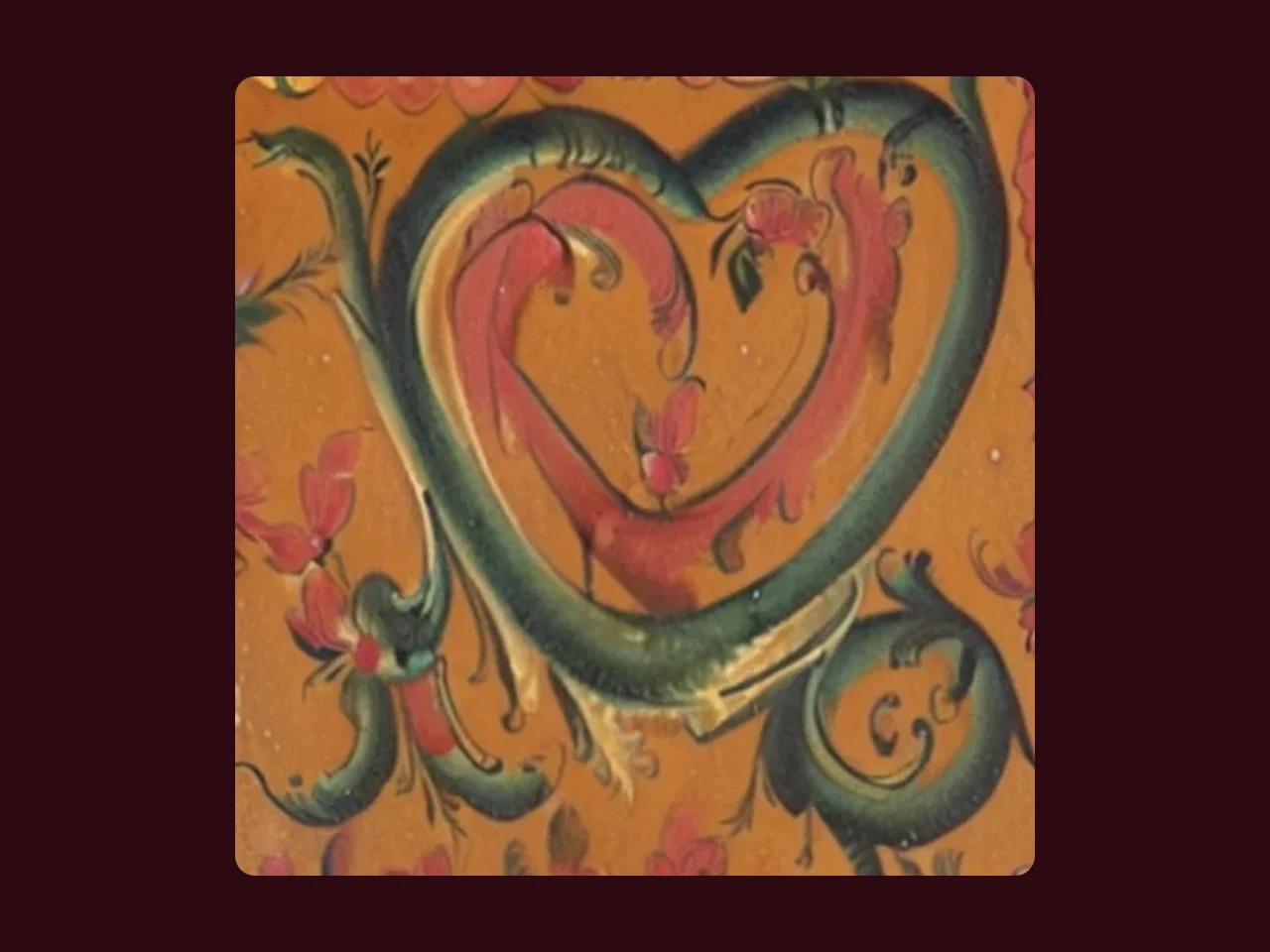 Rosemaling in the shape of a heart, made by the AI from a visitor's drawing