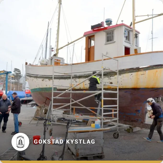 Gokstad Kystlag: an old fishing boat on stilts being restored at the harbour